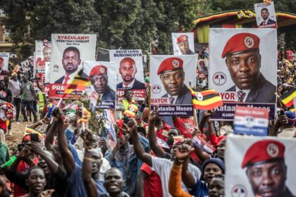 Supporters of opposition leader and presidential candidate Bobi Wine at his final rally in