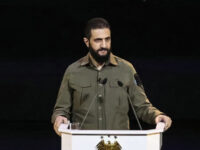 Syrian President Ahmed al-Sharaa delivers a speech during a ceremony at the Convention Cen