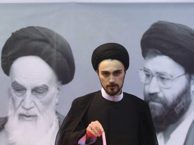 TEHRAN, IRAN - JULY 05: Ahmad Khomeini votes at Jamaran Hussainiya on July 05, 2024 in Teh