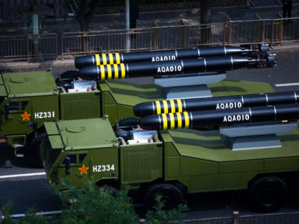 Military vehicles transport aqa-010 torpedo past Tian'anmen Square during V-Day milit
