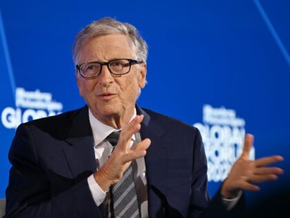 Creepy Bill Gates speaking on stage