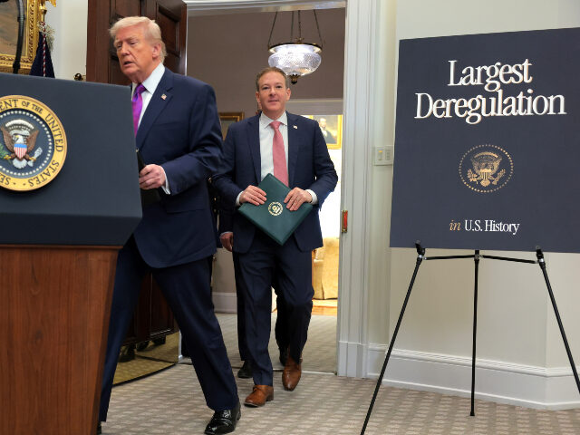 U.S. President Donald Trump (L) and U.S. Environmental Protection Agency Administrator Lee