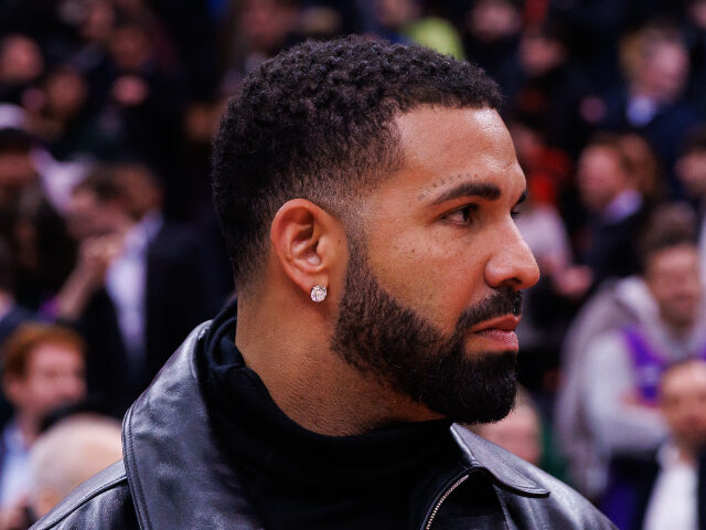Rapper Drake leaves the court following the NBA game between the Toronto Raptors and the G