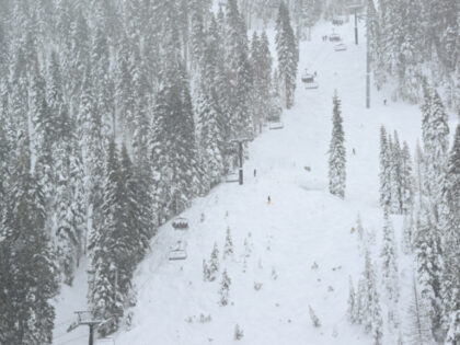 Skiers flock Palisades Tahoe ski resort in Olympic Valley, California, United States on Ma