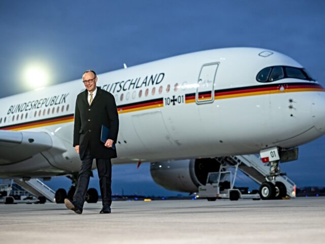 24 February 2026, Brandenburg, Schönefeld: Federal Chancellor Friedrich Merz (CDU) makes