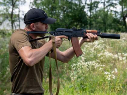 KHARKIV, UKRAINE - JULY 20: A Ukrainian is seen testing a volunteer-made suppressor on the