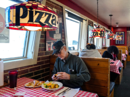 HEMPSTEAD, TEXAS - JANUARY 10: Gil Weber sits down for lunch at the dine-in Pizza Hut on W