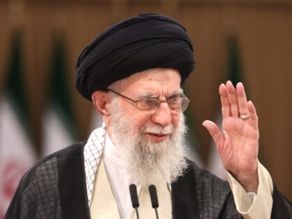 Iran's supreme leader Ayatollah Ali Khamenei speaks after casting his ballot during the ru