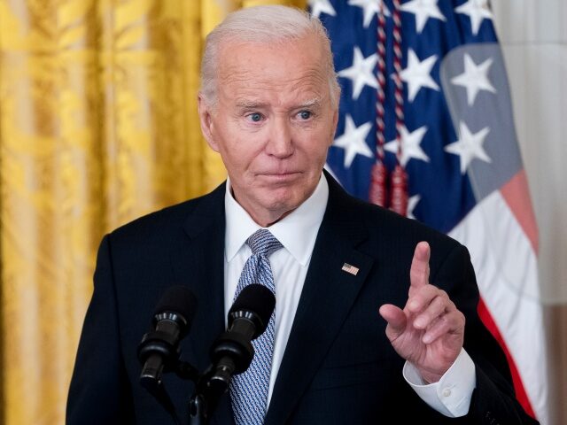 US President Joe Biden speaks during a reception in the East Room of the White House in Wa