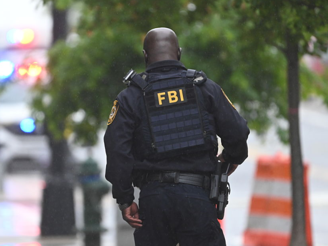 WASHINGTON, DC, UNITED STATES - MAY 22: FBI agents along with Metropolitan Police work the