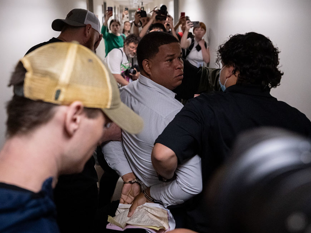 NEW YORK, NEW YORK - JUNE 6: A Dominican man is detained by plainclothes officers with Imm