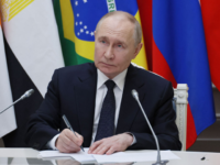 In this pool photograph distributed by Russian state agency Sputnik, Russia's President Vl