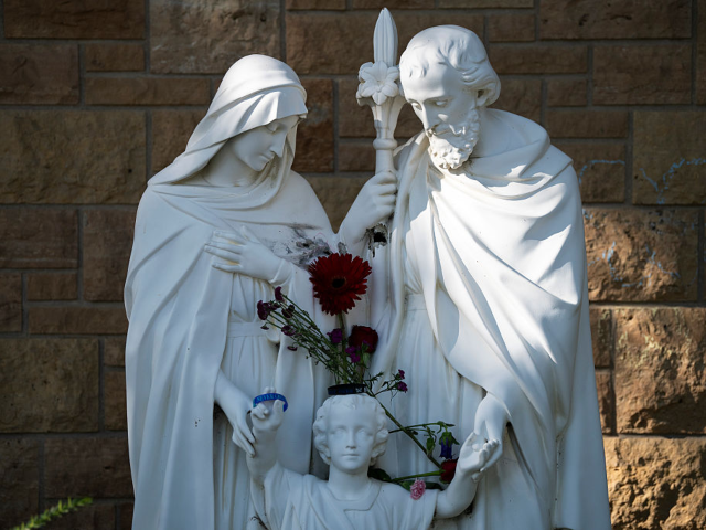 MINNEAPOLIS, MINNESOTA - AUGUST 30: Holes are seen in a statue outside Annunciation Church