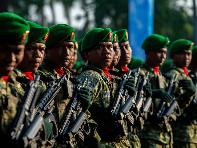 Members of special forces prepare for the 80th Anniversary Parade of the Indonesian Nation