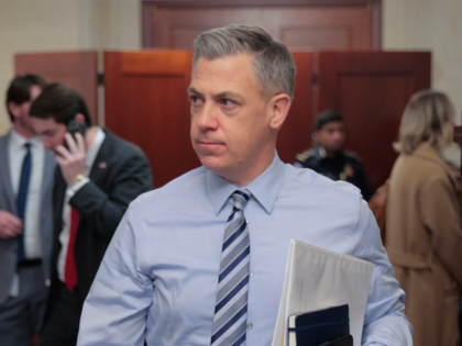 WASHINGTON, DC - DECEMBER 11: Senate Banking Committee member Sen. Jim Banks (R-IN) (C) le