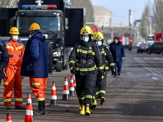 Rescuers prepare to work at the site of an explosion site of a plate plant of Baogang Unit