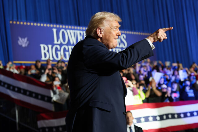 CLIVE, IOWA - JANUARY 27: U.S. President Donald Trump takes the stage to speak during a ra