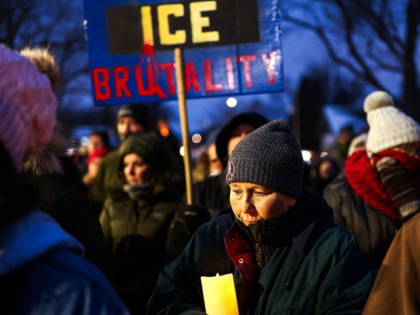 TOPSHOT - People gather for a vigil for Alex Pretti, who was recently shot and killed by f