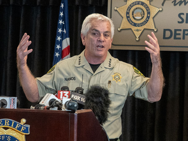 GettyImages-2259244859 CATALINA, ARIZONA - FEBRUARY 3: Pima County Sheriff, Chris Nanos (left), speaks to the med