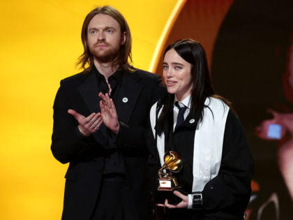 LOS ANGELES, CALIFORNIA - FEBRUARY 01: FINNEAS and Billie Eilish accept the Song of the Ye