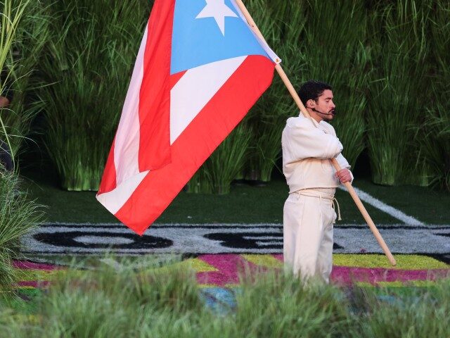 Bad Bunny performs during halftime. The New England Patriots and Seattle Seahawks played i