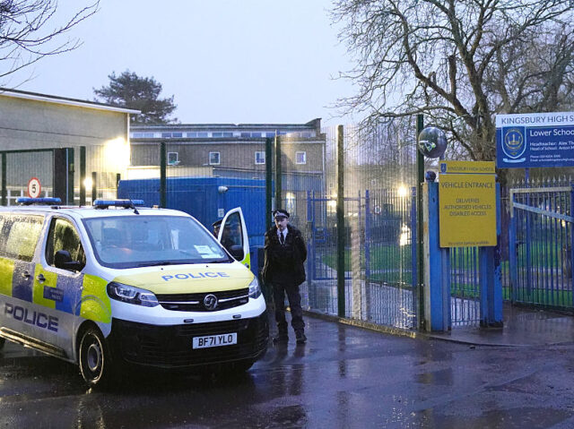 Police at the scene at Kingsbury High School, north west London, where two boys, aged 12 a