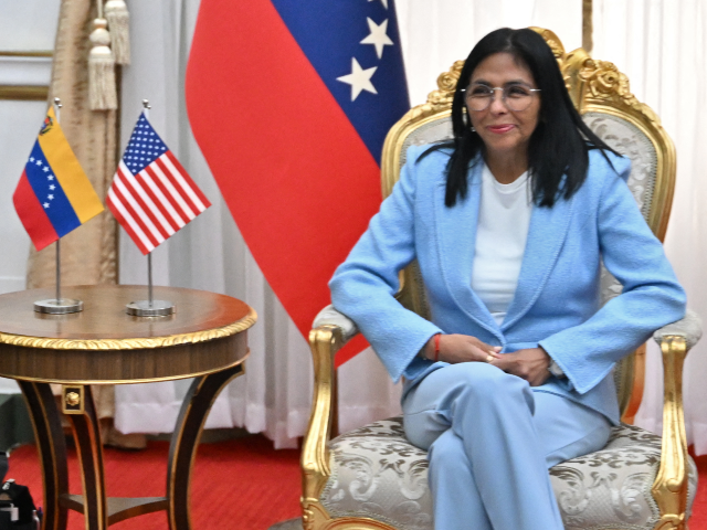 US Secretary of Energy Chris Wright (L) meets with Venezuela's acting president Delcy Rodr