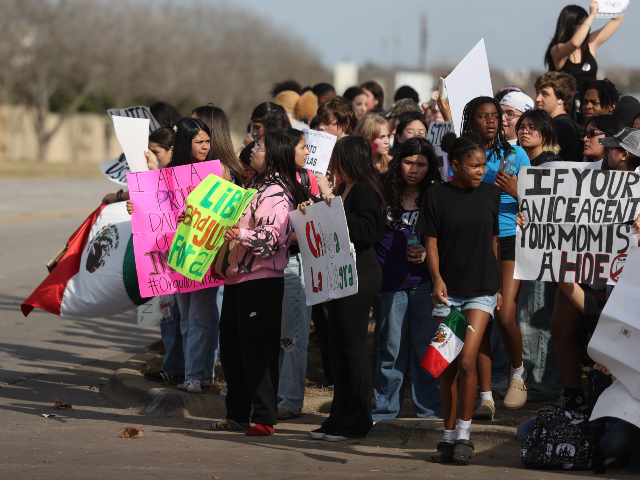 Hundreds of Cedar Ridge High School students stage a walkout in Round Rock, Texas, on Febr