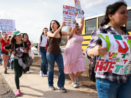 Hundreds of Cedar Ridge High School students stage a walkout in Round Rock, Texas, on Febr