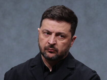 MUNICH, GERMANY - FEBRUARY 13: Ukrainian President Volodymyr Zelensky listens to a journal