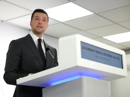 French far-right party Rassemblement National (RN) president Jordan Bardella addresses a p