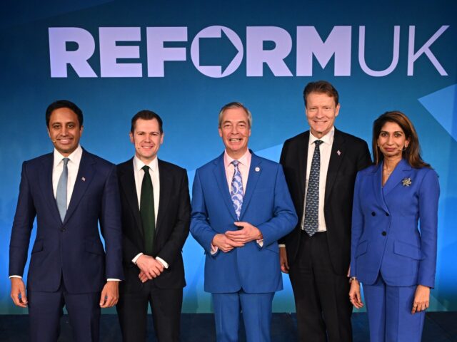 LONDON, ENGLAND - FEBRUARY 17: Reform UK Leader Nigel Farage stands with his shadow cabine