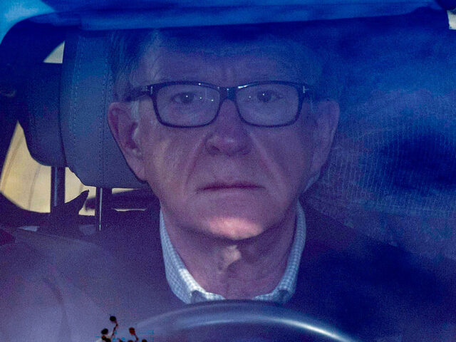 Former UK ambassador to the United States, Peter Mandelson drives away from his residence