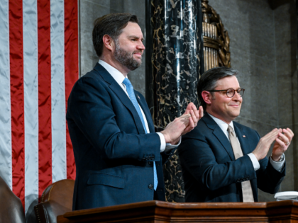 WASHINGTON, DC - FEBRUARY 24: Vice President JD Vance and Speaker Mike Johnson applaud as