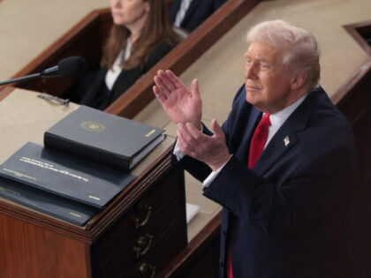 WASHINGTON, DC - FEBRUARY 24: U.S. President Donald Trump applauds during his State of th
