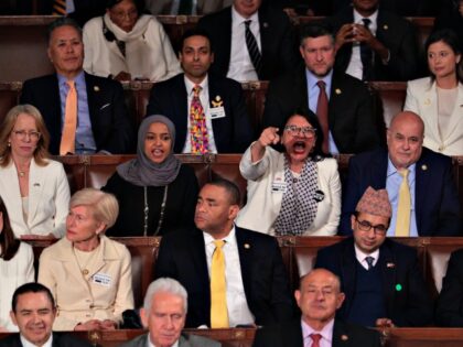 President Trump Delivers The State Of The Union Address WASHINGTON, DC - FEBRUARY 24: Rep. Rashida Tlaib (D-MI) (C) and Rep. Ilhan Omar (D-MI) sho