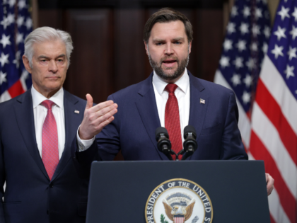 WASHINGTON, DC - FEBRUARY 25: U.S. Vice President JD Vance (R) speaks as Administrator for