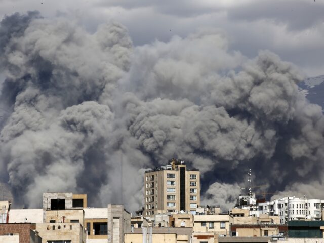 TEHRAN, IRAN - MARCH 01: Smoke rises from the area after it was targeted in attacks as a s
