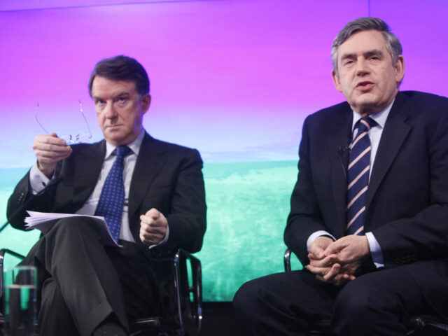Gordon Brown, U.K. prime minister, right, speaks during a press conference as Peter Mandel