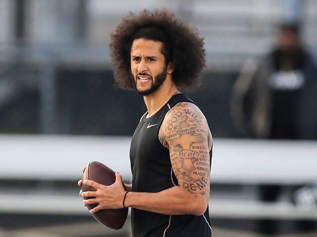 Colin Kaepernick looks to make a pass during a private NFL workout held at Charles R Drew