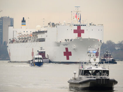 The USNS Comfort hospital ship travels up the Hudson River as it heads to Pier 90 during t