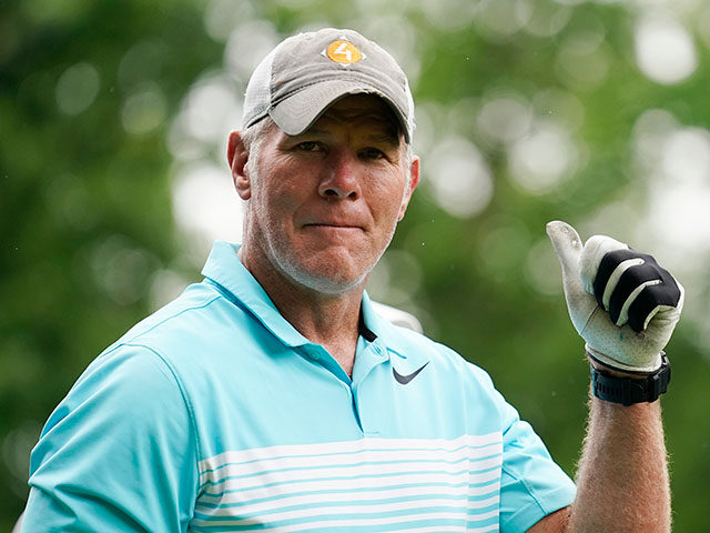 Former NFL player Brett Favre walks off the 10th tee box during the Celebrity Foursome at
