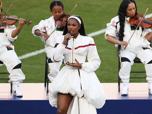 US singer Coco Jones performs "Lift Every Voice and Sing" ahead of Super Bowl LX between t