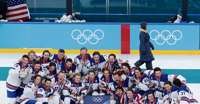 MILAN, ITALY - FEBRUARY 22: Gold medalist Team USA during the victory ceremony following the Ice Hockey Men Final between United States and Canada on day sixteen of the Milano Cortina 2026 Winter Olympic Games at Milano Santagiulia Ice Hockey Arena on February 22, 2026 in Milan, Italy. (Photo by Jean Catuffe/Getty Images)