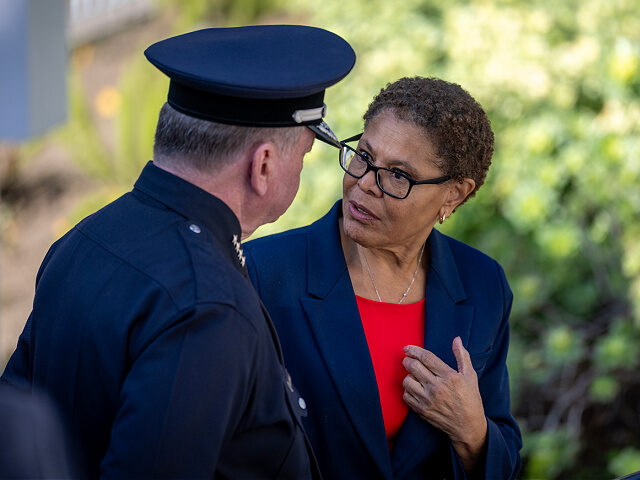 Los Angeles, CA January 7: Los Angeles Police Chief Jim McDonald, left, speaks with Los An
