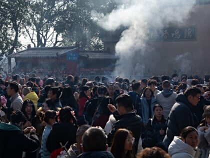 Thousands of people arrive at Jiming Temple during the first day of the Chinese Lunar New