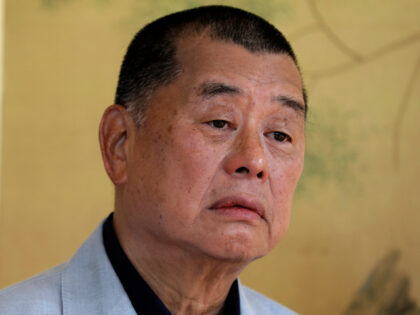 FILE - Hong Kong media tycoon Jimmy Lai pauses during an interview in Hong Kong on July 1,