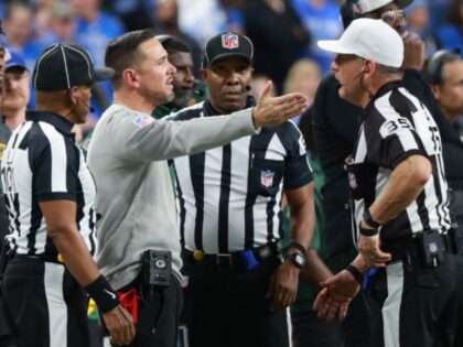 DETROIT,MICHIGAN-December 5: Green Bay Packers head coach Matt LaFleur talks to referre Jo