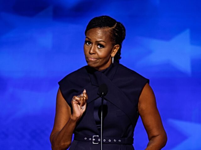 CHICAGO, ILLINOIS - AUGUST 20: Former first lady Michelle Obama speaks on stage during the