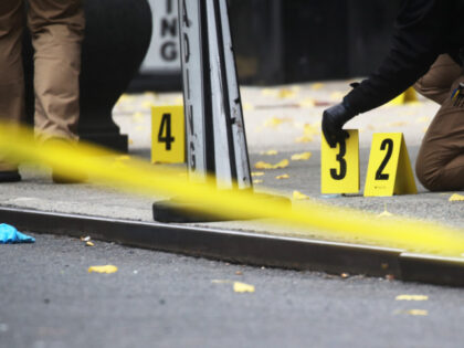 Police place bullet casing markers outside of a Hilton Hotel in Midtown Manhattan where Un